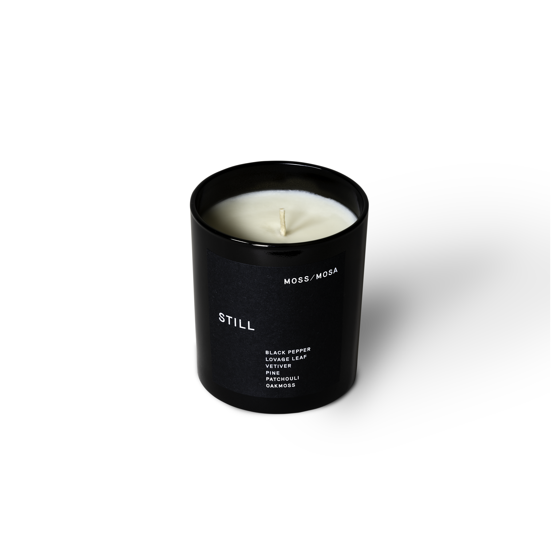 Natural Soy Wax Luxury Candle made in the UK. Notes of Black Pepper, Lovage Leaf, Vetiver, Pine, Patchouli, Oakmoss. Moss Candle that is an aromatic scent. Black pepper and Patchouli give a spicy glow to this otherwise herbaceous candle that is given a hidden depth through the little known Lovage Leaf. 45 hours 270g